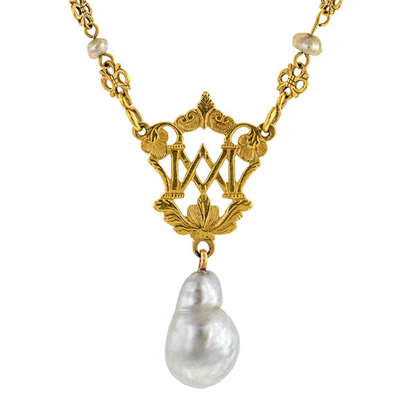 Victorian necklace : an 18k Yellow Gold Ornate Openwork Plaque Accented With Filigree Chain Link With Fresh Water Pearl sold by Doyle  & Doyle vintage and antique jewelry boutique.