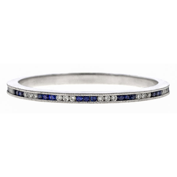 Contemporary ring: a Platinum Wedding Band of Sapphires and Diamonds sold by Doyle & Doyle vintage and antique jewelry boutique.