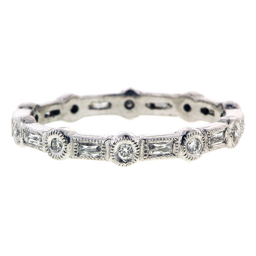 Contemporary ring: a Platinum Bezel Set Round & French Cut Diamond Band sold by Doyle & Doyle vintage and antique jewelry boutique.