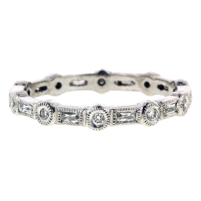 Contemporary ring: a Platinum Bezel Set Round & French Cut Diamond Band sold by Doyle & Doyle vintage and antique jewelry boutique.