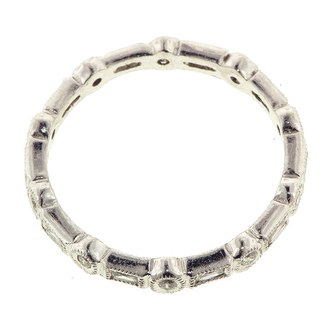 Contemporary ring: a Platinum Bezel Set Round & French Cut Diamond Band sold by Doyle & Doyle vintage and antique jewelry boutique.