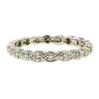 Contemporary ring; a Platinum Rope Pattern Diamond Eternity Wedding Band sold by Doyle & Doyle vintage and antique jewelry boutique.