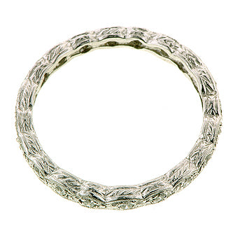 Contemporary ring; a Platinum Rope Pattern Diamond Eternity Wedding Band sold by Doyle & Doyle vintage and antique jewelry boutique.