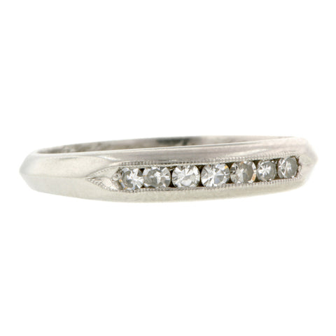 Vintage ring: a Platinum Diamond Wedding Band sold by Doyle & Doyle vintage and antique jewelry boutique.