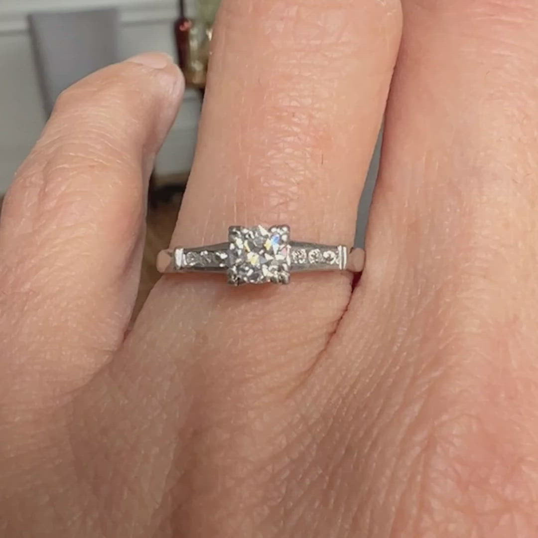 Vintage Diamond Engagement Ring with tapered diamond sides, from Doyle & Doyle an antique and vintage jewelry boutique