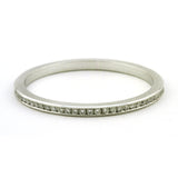 Contemporary ring: a Platinum Channel Set Diamond Eternity Wedding Band sold by Doyle & Doyle vintage and antique jewelry boutique.