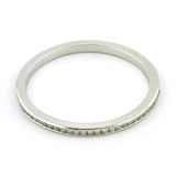 Contemporary ring: a Platinum Channel Set Diamond Eternity Wedding Band sold by Doyle & Doyle vintage and antique jewelry boutique.