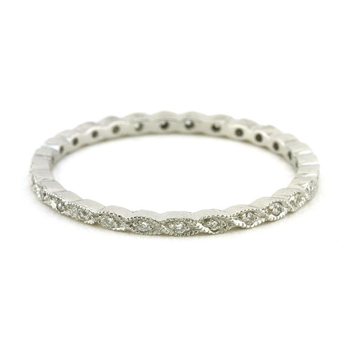 Contemporary ﻿Crossover Twist Diamond Wedding Band sold by Doyle & Doyle vintage and antique jewelry boutique.