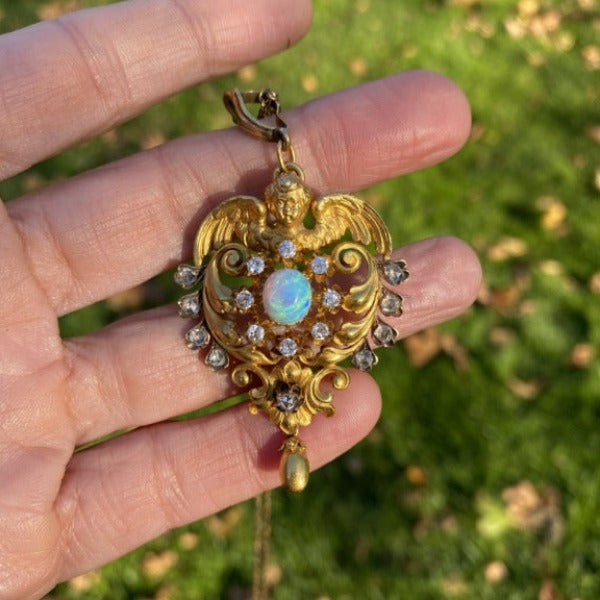 Antique Opal & Diamond Angel Pendant sold by Doyle and Doyle an antique and vintage jewelry boutique