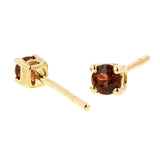 Garnet Stud Earrings: Garnet Stud Earrings set in Yellow Gold, sold by Doyle & Doyle vintage and antique jewelry boutique.