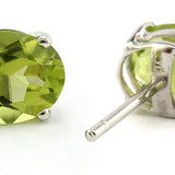 Oval Peridot Stud Earrings, 6x8mm sold by Doyle and Doyle an antique and vintage jewelry boutique