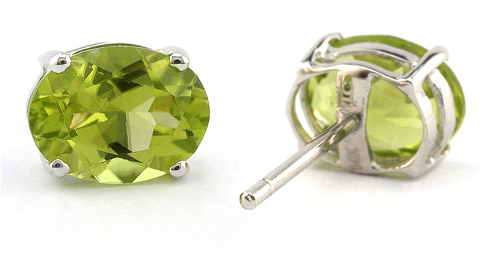 Oval Peridot Stud Earrings, 6x8mm sold by Doyle and Doyle an antique and vintage jewelry boutique