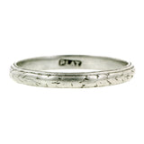 Vintage ring; a Platinum Patterned Wedding Band sold by Doyle & Doyle  vintage and antique jewelry boutique.