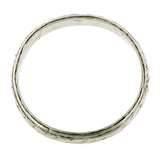 Vintage ring; a Platinum Patterned Wedding Band sold by Doyle & Doyle  vintage and antique jewelry boutique.