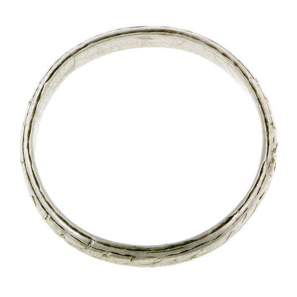 Vintage ring; a Platinum Patterned Wedding Band sold by Doyle & Doyle  vintage and antique jewelry boutique.