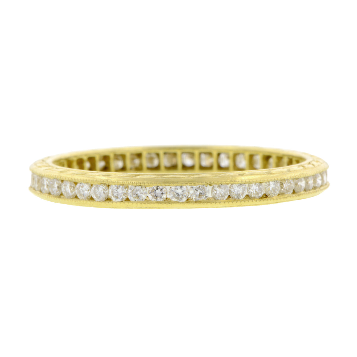 Contemporary ring: a Yellow Gold Channel Set Diamond Eternity Wedding Band sold by Doyle & Doyle vintage and antique jewelry boutique.