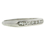 Vintage ring: a Platinum Diamond Wedding Band sold by Doyle & Doyle vintage and antique jewelry boutique.
