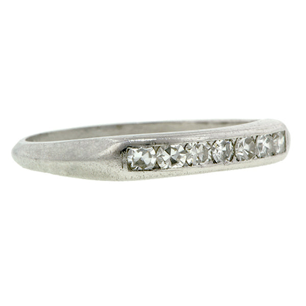 Vintage ring: a Platinum Diamond Wedding Band sold by Doyle & Doyle vintage and antique jewelry boutique.