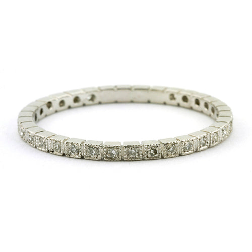 Contemporary ring: a Platinum Square Pattern Diamond Eternity Wedding Band sold by Doyle & Doyle vintage and antique jewelry boutique.