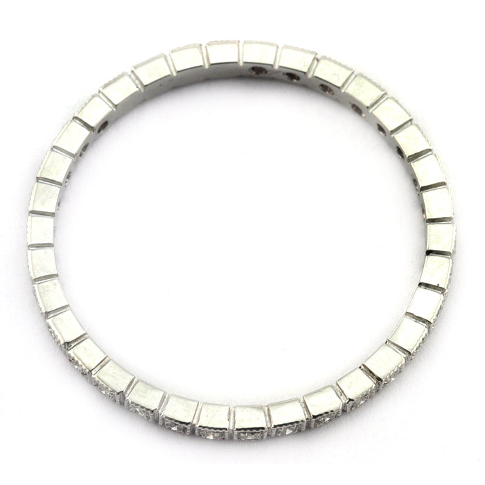 Contemporary ring: a Platinum Square Pattern Diamond Eternity Wedding Band sold by Doyle & Doyle vintage and antique jewelry boutique.