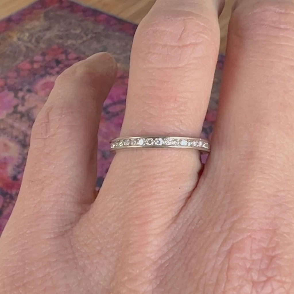 Vintage Diamond Eternity Wedding Band sold by Doyle and Doyle an antique and vintage jewelry boutique