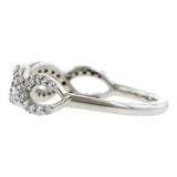 Contemporary ring: a Platinum Entwined Diamond Band- Heirloom sold by Doyle & Doyle vintage and antique jewelry boutique.