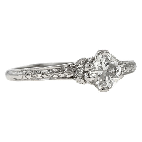 Contemporary ring: a Platinum Flower Engagement Ring, Old Euro 0.54ct.-Heirloom sold by Doyle & Doyle vintage and antique jewelry boutique.