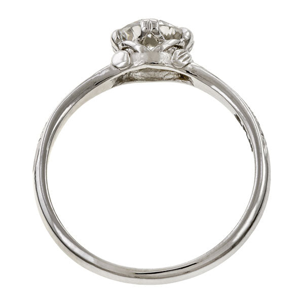Contemporary ring; a Platinum Flower Engagement Ring, Old Euro 0.74ct sold by Doyle & Doyle vintage and antique jewelry boutique.