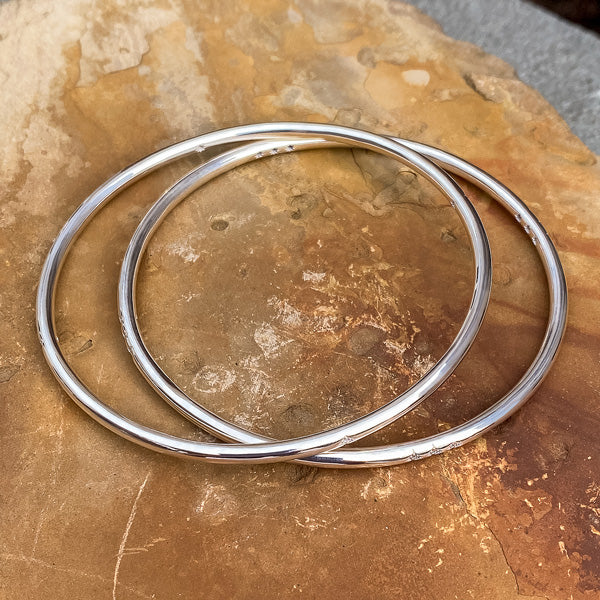 Single Station Diamond Bangle Bracelet sold by Doyle and Doyle an antique and vintage jewelry boutique