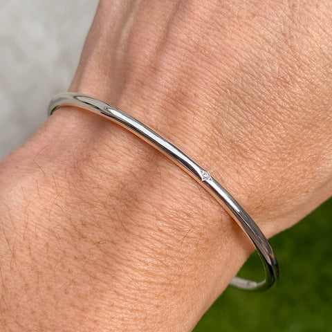 Single Station Diamond Bangle Bracelet sold by Doyle and Doyle an antique and vintage jewelry boutique