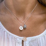 You and Me Sphere Heart Pendant Necklace sold by Doyle and Doyle an antique and vintage jewelry boutique