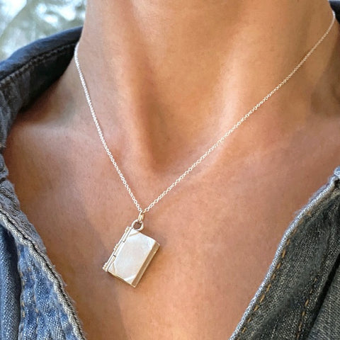 Contemporary necklace: a Sterling Silver Book Locket- Heirloom sold by Doyle & Doyle vintage and antique jewelry boutique