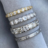 Contemporary ring: a Gold Entwined Diamond Wedding Band- Heirloom sold by Doyle & Doyle vintage and antique jewelry boutique.