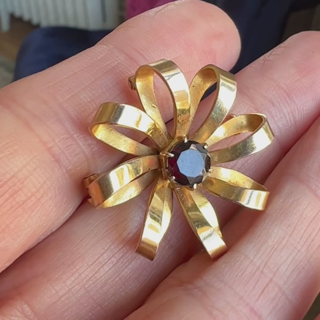 Vintage Garnet Pin sold by Doyle and Doyle an antique and vintage jewelry boutique