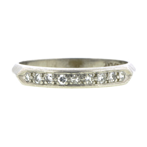 Vintage ring: a Platinum Diamond Wedding Band sold by Doyle & Doyle vintage and antique jewelry boutique.