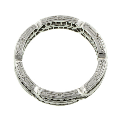 Contemporary ring: a Platinum Geometric Crossover Round Brilliant Cut Diamond Eternity Band sold by Doyle & Doyle vintage and antique jewelry boutique.