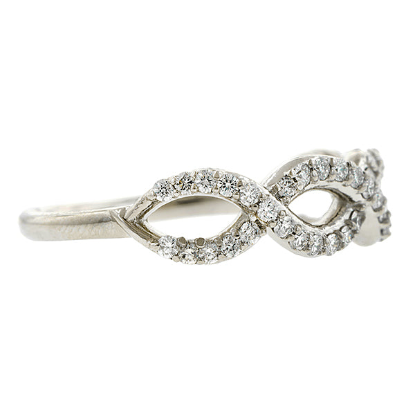 Contemporary ring: a Platinum Entwined Diamond Band- Heirloom sold by Doyle & Doyle vintage and antique jewelry boutique.