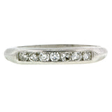 Vintage ring: a Platinum Diamond Wedding Band sold by Doyle & Doyle vintage and antique jewelry boutique.