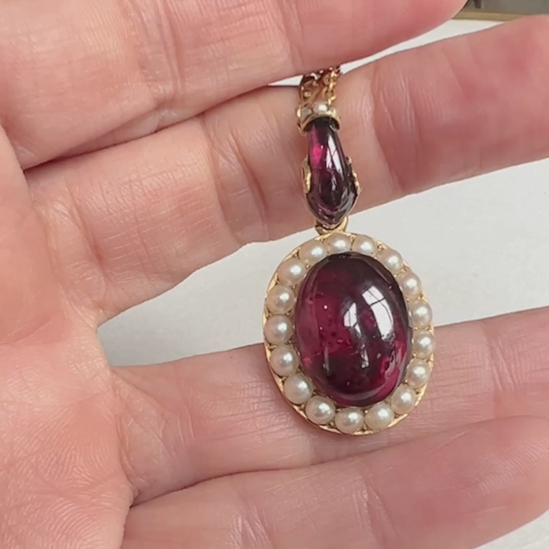 Victorian Garnet Snake Necklace sold by Doyle and Doyle an antique and vintage jewelry boutique